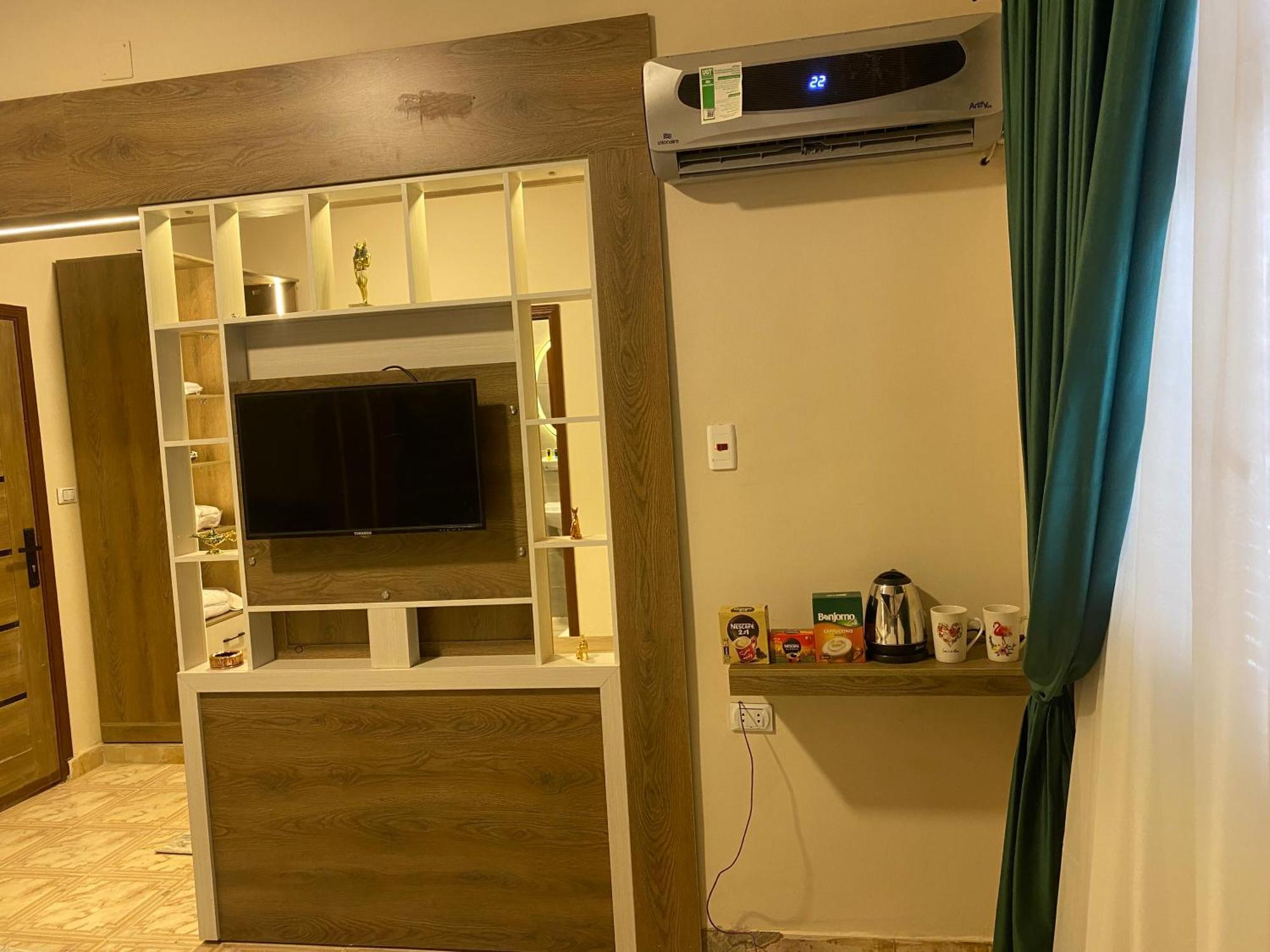 Global Pyramids View Inn Kafret el-Gabal Екстериор снимка
