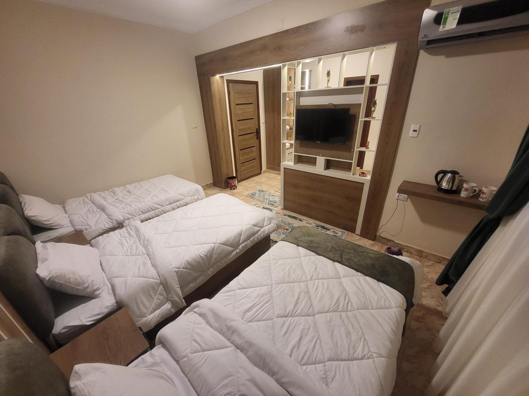 Global Pyramids View Inn Kafret el-Gabal Екстериор снимка