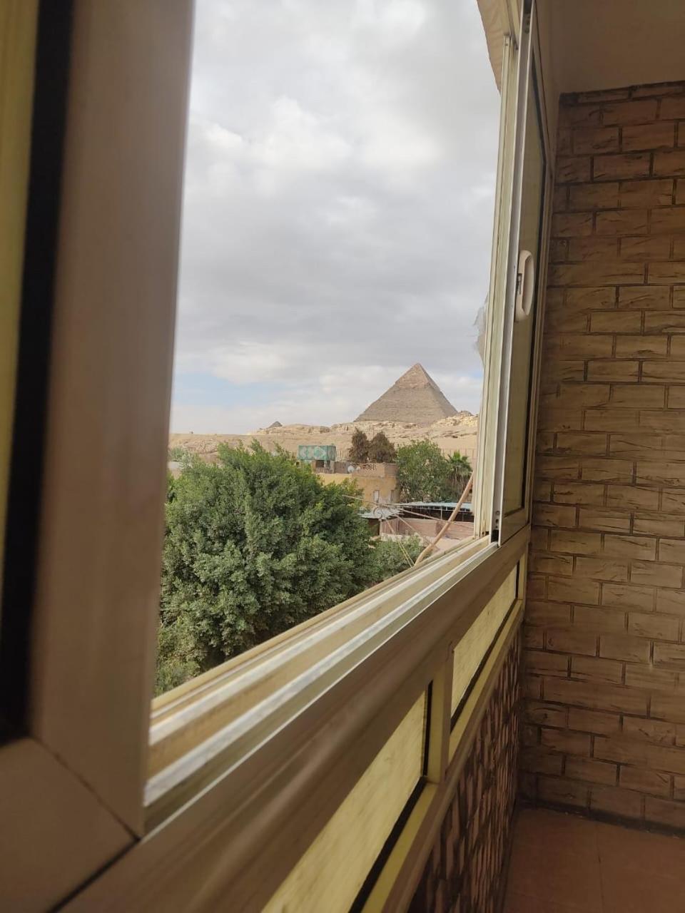 Global Pyramids View Inn Kafret el-Gabal Екстериор снимка