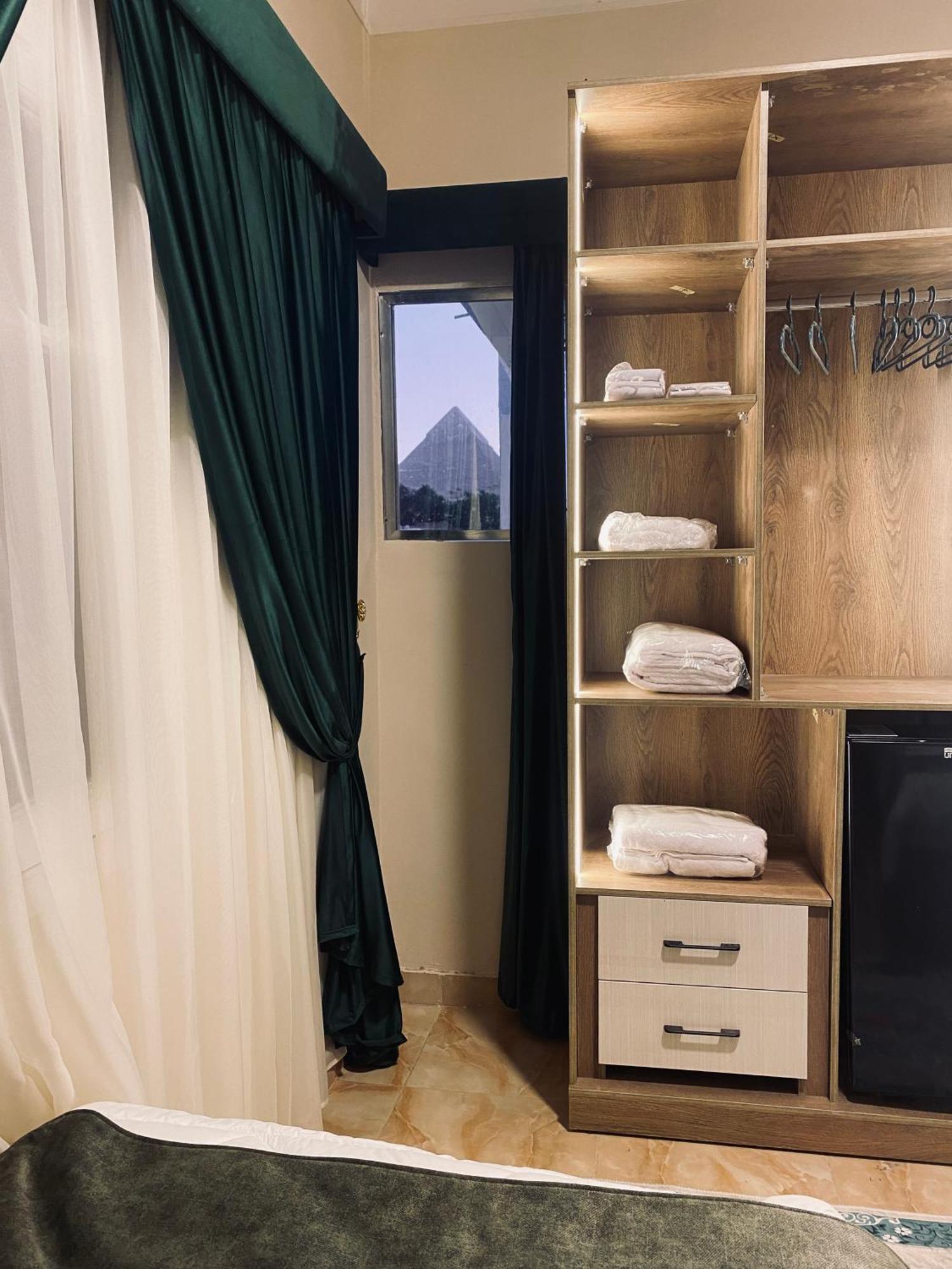 Global Pyramids View Inn Kafret el-Gabal Екстериор снимка